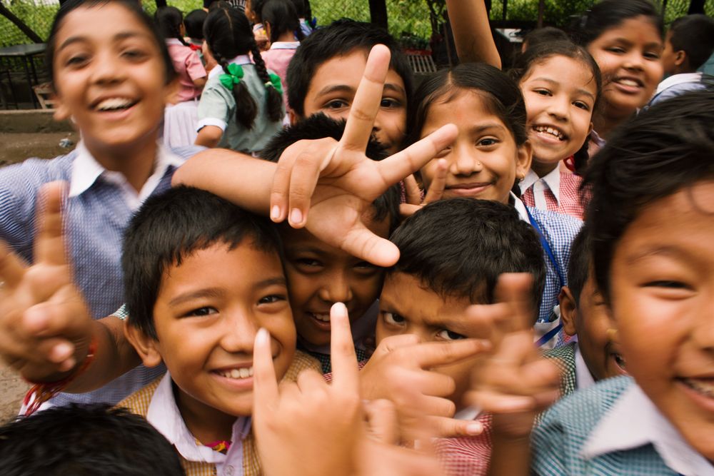 Schoolchildren outside the campus at the start of the day
