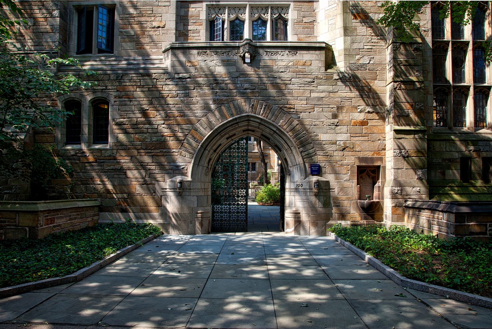 The school campus building seen across the lawns