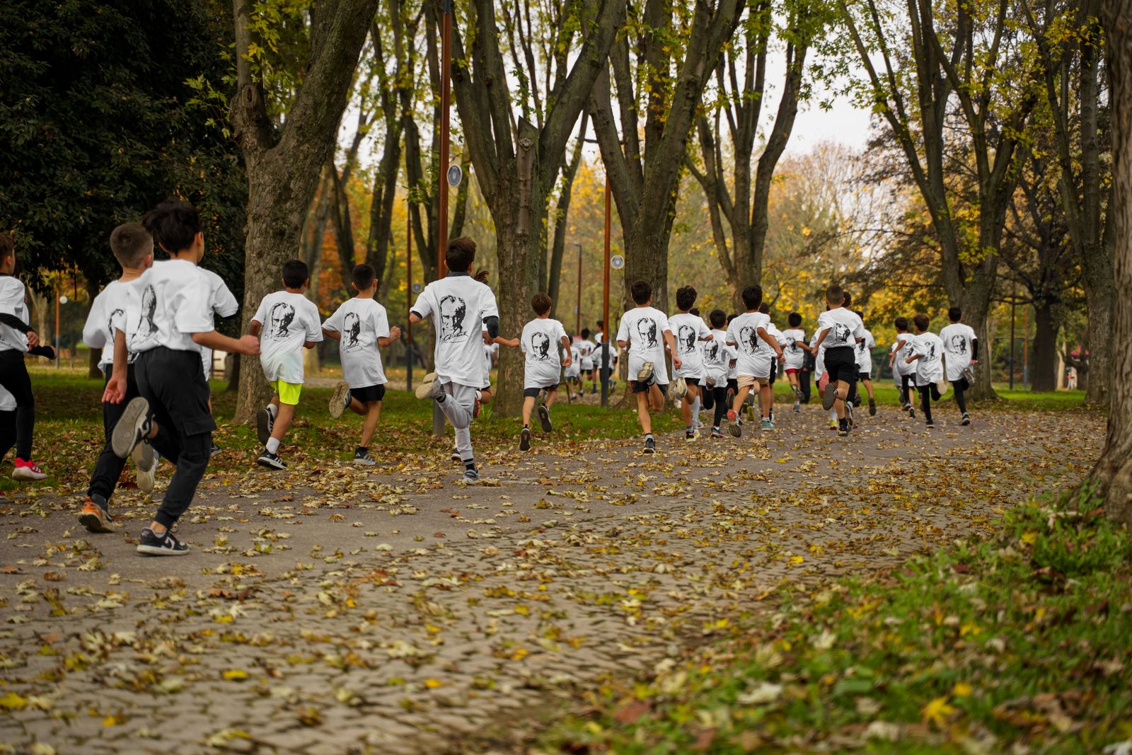 Children running on the sports field